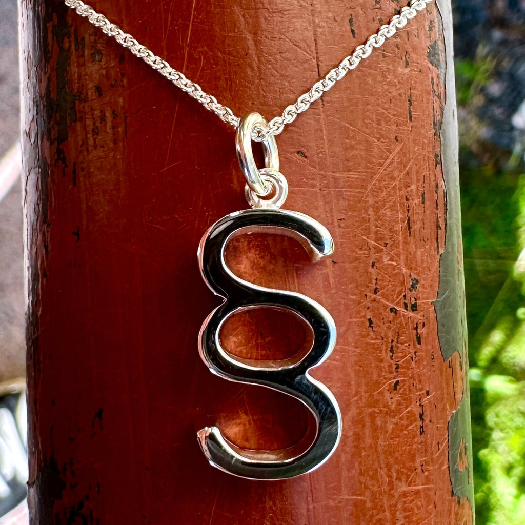 Pykälämerkki - hopea riipus